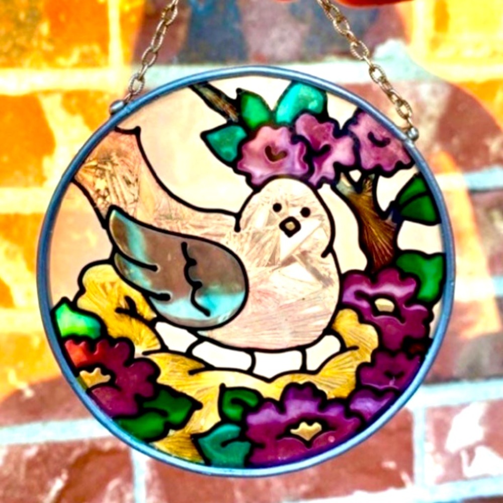 Cute small round stained glass window suncatcher wall hanging of a bird/nest